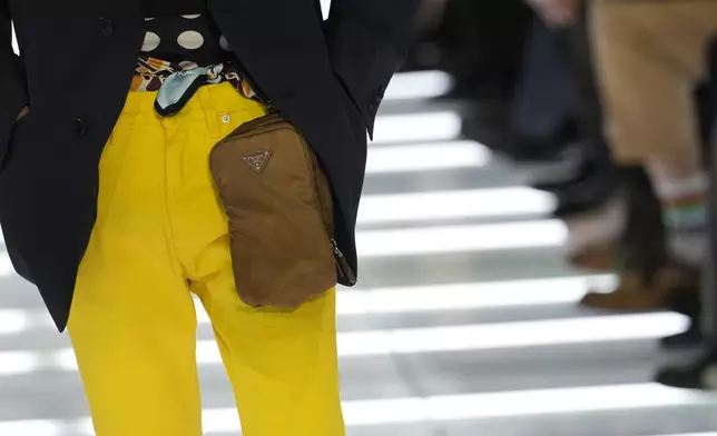 A model wears a creation from Prada's Spring/Summer 2027 men's collection presented in Milan, Italy, Sunday, June 21, 2026. (AP Photo/Luca Bruno)