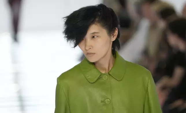 A model wears a creation from Prada's Spring/Summer 2027 men's collection presented in Milan, Italy, Sunday, June 21, 2026. (AP Photo/Luca Bruno)