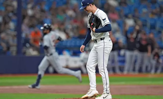 Tampa Bay Rays pitcher Griffin Jax reacts as Detroit Tigers' Riley Greene, left, runs the bases after his solo home run during the third inning of a baseball game Monday, June 1, 2026, in St. Petersburg, Fla. (AP Photo/Chris O'Meara)