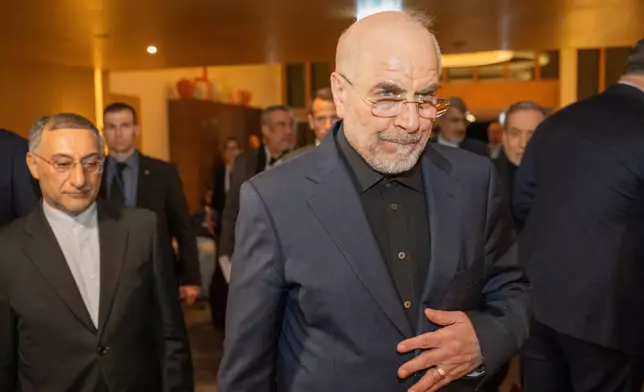 Speaker of the Islamic Parliament of Iran Mohammed Bagher Ghalibaf, center, arrives at the Buergenstock resort in Obbuergen, near Lucerne, Switzerland, early Sunday, June 21, 2026. (Urs Flueeler/Keystone, Pool via AP)