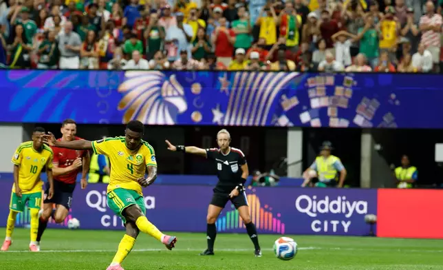 South Africa's Teboho Mokoena scores a penalty, his side's first goal during the World Cup Group A soccer match between Czechia and South Africa in Atlanta, Thursday, June 18, 2026. (AP Photo/Erik S. Lesser)