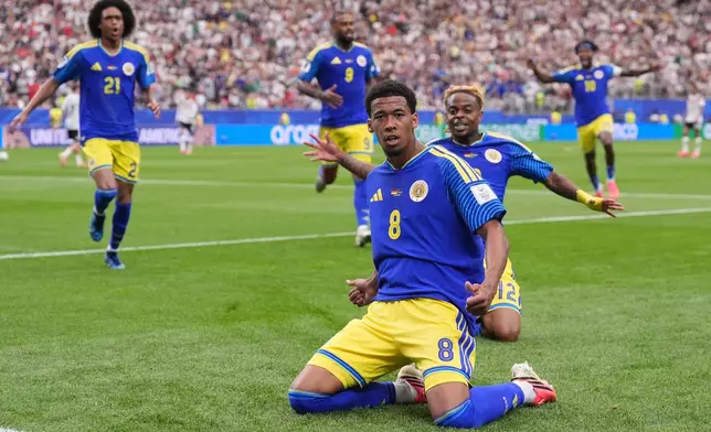 Curaçao's Livano Comenencia celebrates after scoring during the World Cup Group E soccer match between Germany and Curacao in Houston, Sunday, June 14, 2026. (AP Photo/Eric Gay)