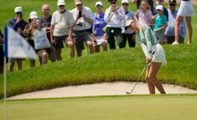 Nelly Korda chips onto the seventh green during the final round of the Women's PGA Championship golf tournament at Hazeltine National Golf Club, Sunday, June 28, 2026, in Chaska, Minn. (AP Photo/Matt York)
