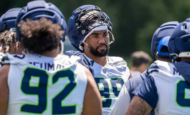 Seattle Seahawks defensive lineman Leonard Williams watches during NFL football practice at the team's training facility, Tuesday, June 9, 2026, in Renton, Wash. (AP Photo/Stephen Brashear)