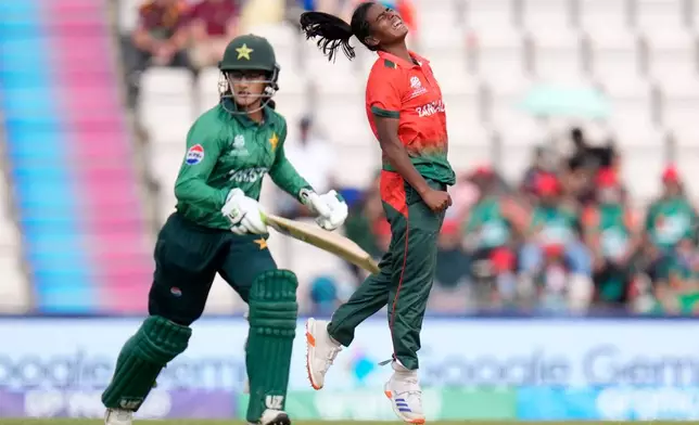 Marufa Akter of Bangladesh (right) reacts after bowling during the ICC Women's T20 World Cup match between Pakistan and Bangladesh, at the Hampshire Bowl, Southampton, England, Saturday June 20, 2026. (Andrew Matthews/PA via AP)