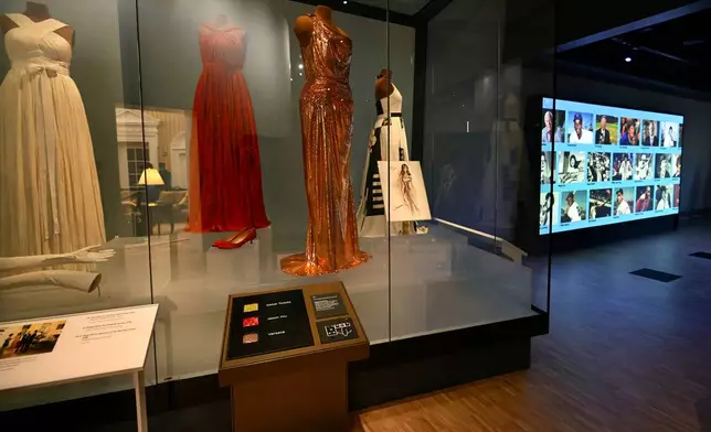 Former First Lady Michelle Obama's dresses on display at the Obama Presidential Center in Chicago, Thursday, May 28, 2026. (AP Photo/Paul Beaty)