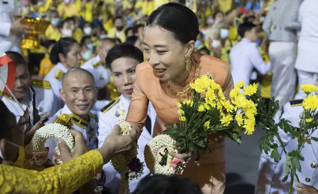 FILE - Thai Princess Bajrakitiyabha Mahidol shakes hands while meeting supporters in Bangkok, Thailand, Nov. 1, 2020. (AP Photo/Wason Wanichakorn, File)