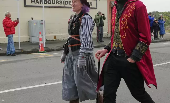 Participants march in a parade at the Steampunk NZ Festival in Ōamaru, New Zealand, on May 30, 2026. (AP Photo/Charlotte Graham-McLay)