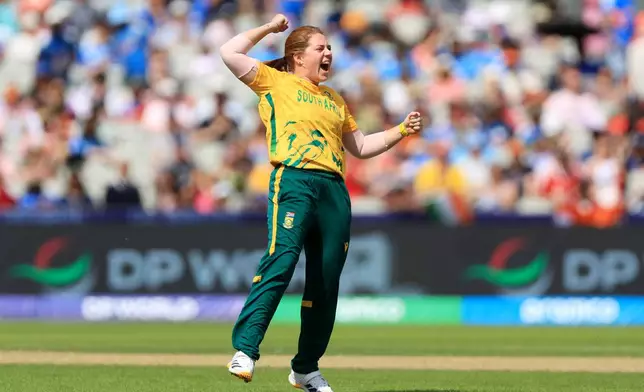 South Africa's Nadine de Klerk celebrates taking the wicket of India's Jemimah Rodrigues during the ICC Women's T20 World Cup match between India and South Africa, at Emirates Old Trafford, Manchester, England, Sunday June 21, 2026. (Nigel French/PA via AP)