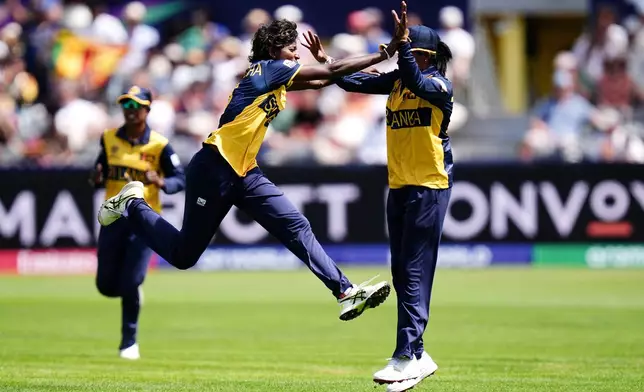 Sri Lanka's Kaveesha Dilhari celebrates bowling out West Indies' Chinelle Henry during the ICC Women's T20 World Cup match between Sri Lanka and West Indies, in Manchester, England, Sunday, June 21, 2026. ( Jacob King/PA via AP)