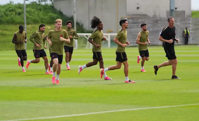 Canada players work out during a training session on the eve of the team's World Cup soccer match against Bosnia, Thursday, June 11, 2026, in Toronto. (AP Photo/Stephanie Scarbrough)