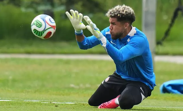 Canada goalkeeper Dayne St. Clair works out during a training session on the eve of the team's World Cup soccer match against Bosnia, Thursday, June 11, 2026, in Toronto. (AP Photo/Stephanie Scarbrough)
