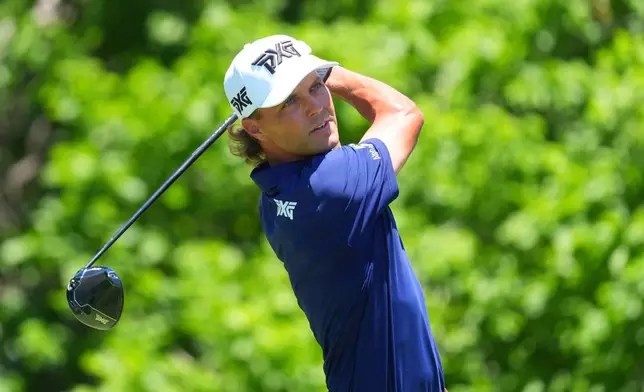 Eric Cole watches a tee shot on the sixth hole during the final round of the Charles Schwab Challenge golf tournament at Colonial Country Club in Fort Worth, Texas, Sunday, May 31, 2026. (AP Photo/LM Otero)