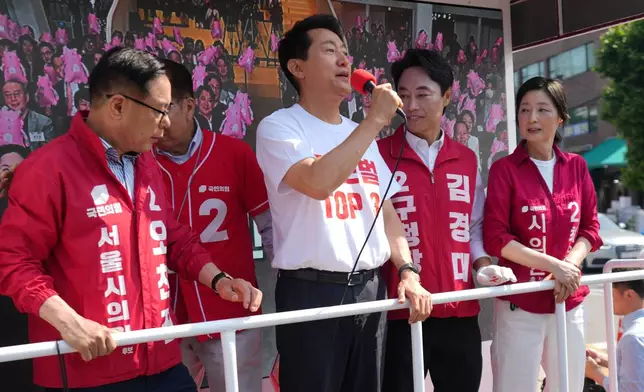 Seoul mayoral candidate Oh Se-hoon of the main opposition People Power Party speaks during an election campaign for June 3 nationwide simultaneous local elections in Seoul, South Korea, Tuesday, June 2, 2026. (AP Photo/Lee Jin-man)