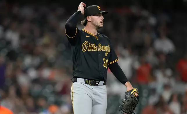 Pittsburgh Pirates pitcher Paul Skenes reacts after Houston Astros' Cam Smith's RBI single during the fifth inning of a baseball game against the Pittsburgh Pirates, Wednesday, June 3, 2026, in Houston. (AP Photo/Karen Warren)