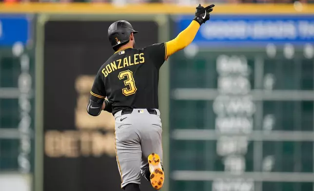 Pittsburgh Pirates' Nick Gonzales reacts as he ran the bases after hitting his two-run home run against Houston Astros relief pitcher Nate Pearson during the seventh inning of a baseball game against the Pittsburgh Pirates, Wednesday, June 3, 2026, in Houston. (AP Photo/Karen Warren)