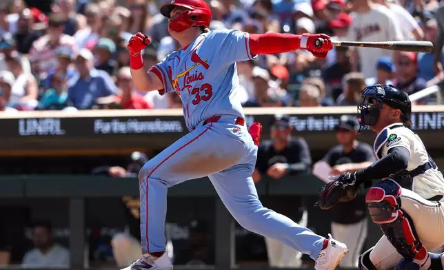 St. Louis Cardinals' Blaze Jordan hits his first career home run against the Minnesota Twins during the seventh inning of a baseball game, Saturday, June 13, 2026, in Minneapolis. (AP Photo/Matt Krohn)
