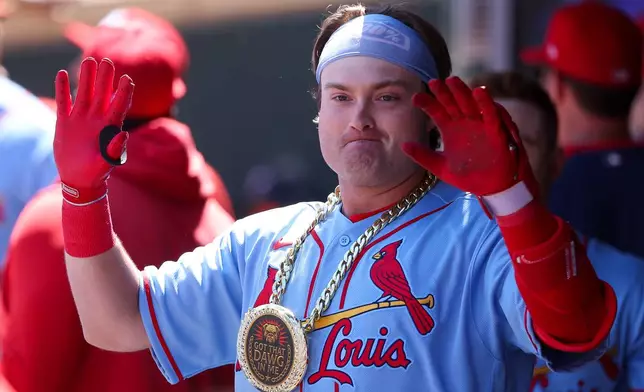 St. Louis Cardinals' Blaze Jordan celebrates his first career home run against the Minnesota Twins during the seventh inning of a baseball game, Saturday, June 13, 2026, in Minneapolis. (AP Photo/Matt Krohn)
