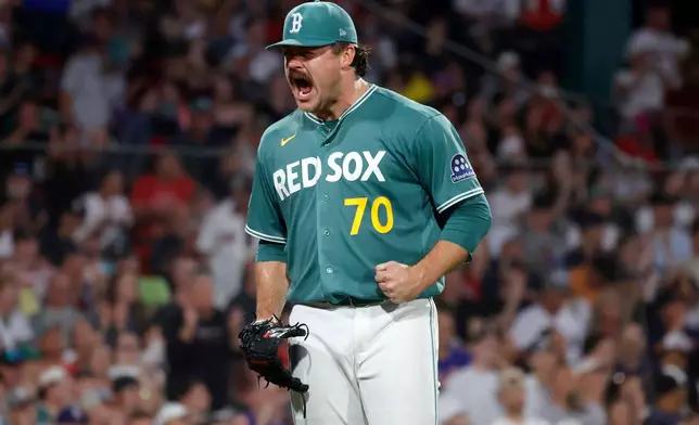 Boston Red Sox starting pitcher Payton Tolle reacts after getting the third out during the seventh inning of a baseball game against the New York Yankees, Friday, June 26, 2026, in Boston. (AP Photo/Mary Schwalm)