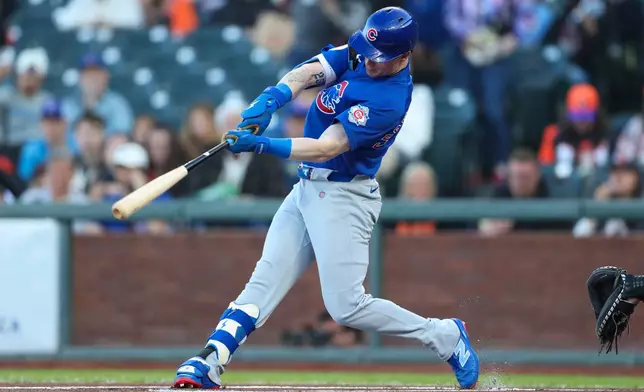Chicago Cubs' Pete Crow-Armstrong hits a leadoff solo home run during the first inning of a baseball game against the San Francisco Giants, Saturday, June 13, 2026, in San Francisco, Calif. (AP Photo/Scott Marshall)