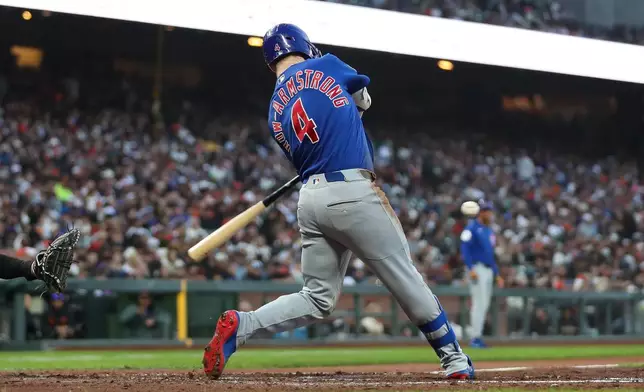 Chicago Cubs' Pete Crow-Armstrong hits a single during the fourth inning of a baseball game against the San Francisco Giants Saturday, June 13, 2026, in San Francisco, Calif. (AP Photo/Scott Marshall)
