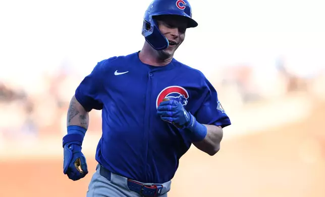 Chicago Cubs' Pete Crow-Armstrong jogs around the bases after hitting a leadoff solo home run during the first inning of a baseball game against the San Francisco Giants, Saturday, June 13, 2026, in San Francisco, Calif. (AP Photo/Scott Marshall)