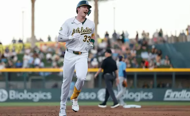 Athletics' Henry Bolte (33) rounds the bases after hitting a two run home run during the second inning of a baseball game against the Milwaukee Brewers, Tuesday, June 9, 2026, in Las Vegas. (AP Photo/Caroline Brehman)