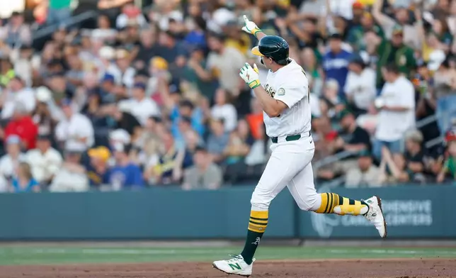 Athletics' Nick Kurtz (16) round the bases after hitting a solo home run during the first inning of a baseball game against the Milwaukee Brewers, Tuesday, June 9, 2026, in Las Vegas. (AP Photo/Caroline Brehman)