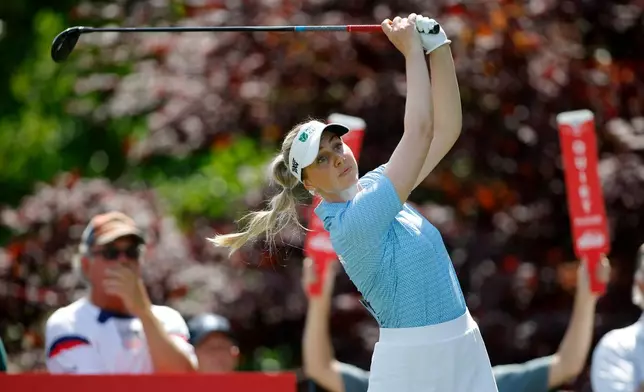 Olivia Cowan, of Germany, watches her tee shot on the 17th hole during the first round of the Dow Championship LPGA golf tournament, Thursday, June 11, 2026, at Midland Country Club in Midland, Mich. (AP Photo/Al Goldis)