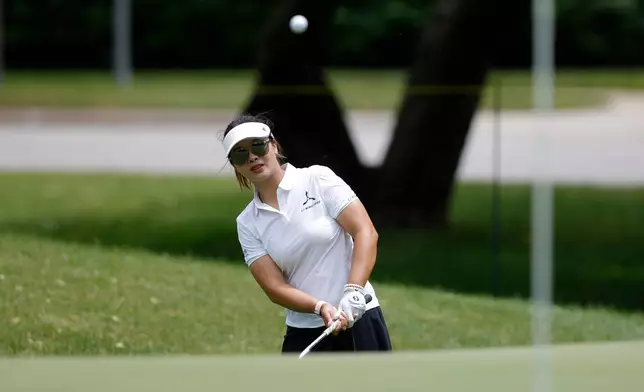 Yahui Zhang, of China, hits onto the 16th green during the first round of the Dow Championship LPGA golf tournament, Thursday, June 11, 2026, at Midland Country Club in Midland, Mich. (AP Photo/Al Goldis)