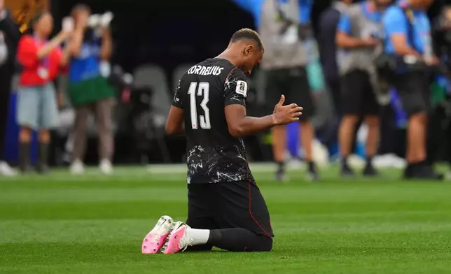 Canada's Derek Cornelius (13) prays before the World Cup round of 32 soccer match between South Africa and Canada in Inglewood, Calif., near Los Angeles, Sunday, June 28, 2026. (AP Photo/Manu Fernandez)