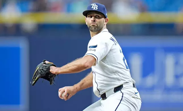 Tampa Bay Rays pitcher Nick Martinez goes into his delivery against the Boston Red Sox during the first inning of a baseball game Tuesday, June 9, 2026, in St. Petersburg, Fla. (AP Photo/Chris O'Meara)