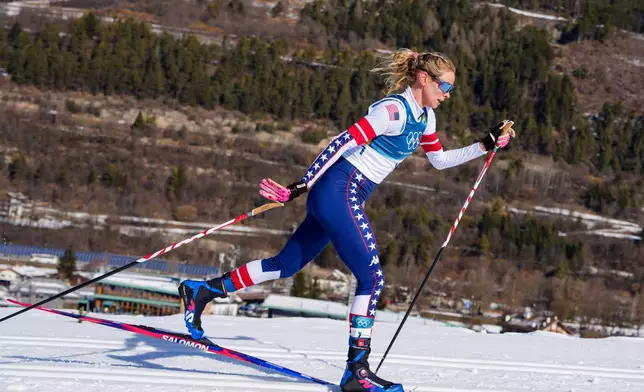 FILE - Jessie Diggins, of the United States, competes in the cross country skiing women's 50-kilometer mass start classic at the 2026 Winter Olympics, in Tesero, Italy, Feb. 22, 2026. (AP Photo/Kirsty Wigglesworth, File)