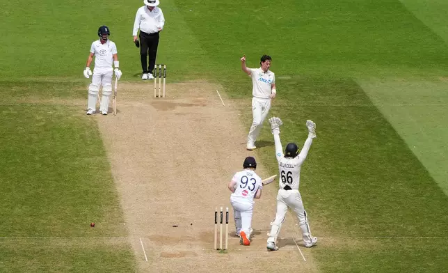 New Zealand's Matt Henry celebrates taking the wicket of England's Jordan Cox on day five of the Second Rothesay Test cricket match between England and New Zealand in London, England, Sunday, June 21, 2026. (Ben Whitley/PA via AP