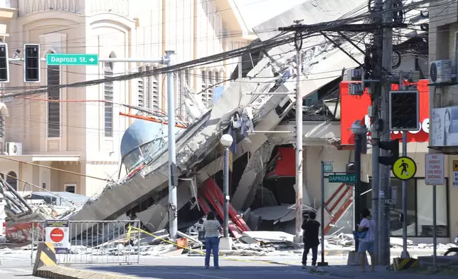 A building is damaged after an earthquake in General Santos, Philippines, Monday, June 8, 2026. (AP Photo)