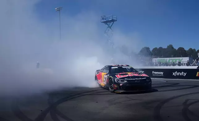 Shane van Gisbergen celebrates after winning a NASCAR Cup Series auto race at Sonoma Raceway, Sunday, June 28, 2026, in Sonoma, Calif. (AP Photo/Jeff Chiu)