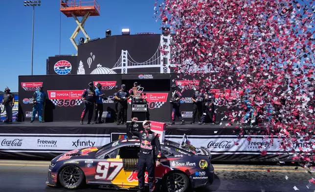 Shane van Gisbergen celebrates after winning a NASCAR Cup Series auto race at Sonoma Raceway, Sunday, June 28, 2026, in Sonoma, Calif. (AP Photo/Jeff Chiu)