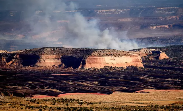 The Snyder Fire burns near Thompson Springs, Utah, on Sunday, June 28, 2026. (AP Photo/Noah Berger)