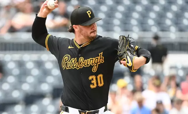Pittsburgh Pirates starting pitcher Paul Skenes (30) throws to the Miami Marlins during the first inning of a baseball game, Sunday, June 14, 2026, in Pittsburgh. (AP Photo/Philip G. Pavely)