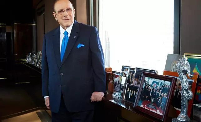 FILE - Sony Music Entertainment's Chief Creative Officer and famous hitmaker Clive Davis posing for a portrait in his office in New York on Feb. 18, 2013. (Photo by Dan Hallman/Invision/AP, File)
