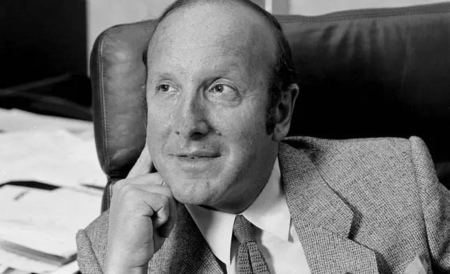 FILE - Record mogul Clive Davis is pictured in his New York office, Sept. 10, 1980. (AP Photo/Marty Reichenthal, File)