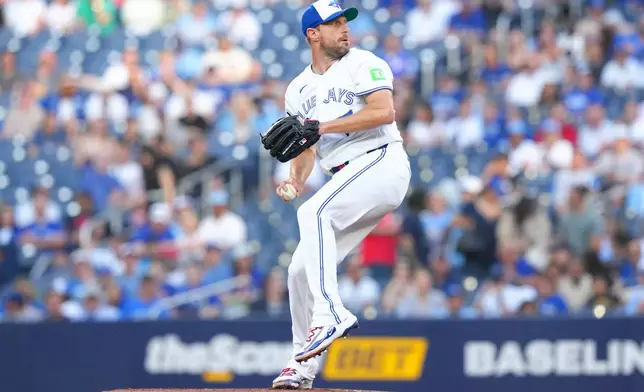 Toronto Blue Jays pitcher Max Scherzer throws a pitch to strike out Philadelphia Phillies designated hitter Kyle Schwarber to record his 3500th strike out during the first inning of a baseball game in Toronto on Wednesday June 10, 2026. (Chris Young/The Canadian Press via AP)