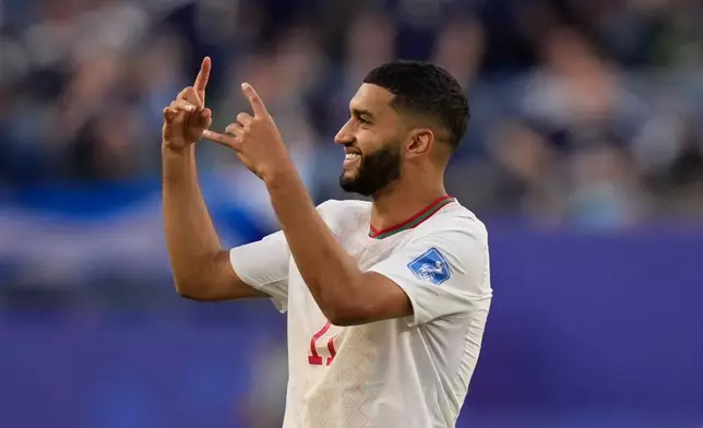 Morocco's Ismael Saibari, gestures to the crowd as he celebrates on the pitch after the end of the during the World Cup Group C soccer match between Scotland and Morocco in Foxborough, Mass., near Boston, Friday, June 19, 2026. (AP Photo/Charles Krupa)