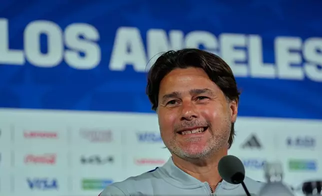 United States head coach Mauricio Pochettino smiles during a press conference ahead of his FIFA World Cup match against Paraguay at SoFi Stadium in Inglewood, Calif., Thursday, June 11, 2026. (AP Photo/Andre Penner)