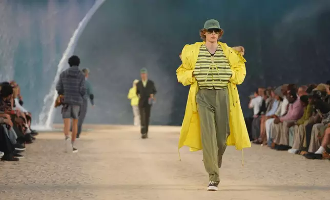 A model wears a creation as part of the Louis Vuitton men's Spring Summer 2027 collection presented in Paris, France, Tuesday, June 23, 2026. (AP Photo/Aurelien Morissard)