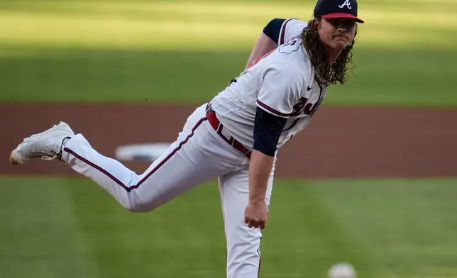 Atlanta Braves pitcher Grant Holmes (66) works against the Toronto Blue Jays in the first inning of a baseball game, Wednesday, June 3, 2026, in Atlanta. (AP Photo/Mike Stewart)