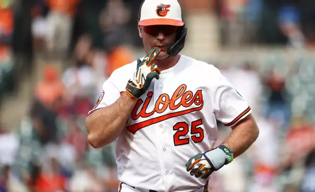 Baltimore Orioles' Pete Alonso celebrates after hitting a home run during the first inning of a baseball game against the San Diego Padres, Saturday, June 13, 2026, in Baltimore. (AP Photo/Daniel Kucin Jr.)