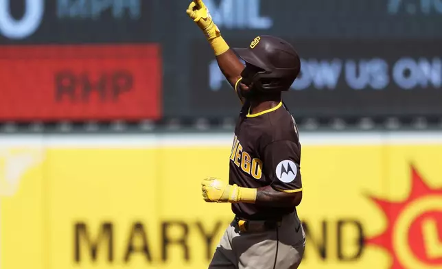 San Diego Padres left fielder Samad Taylor celebrates after hitting a home run during the first inning of a baseball game against the Baltimore Orioles, Saturday, June 13, 2026, in Baltimore. (AP Photo/Daniel Kucin Jr.)