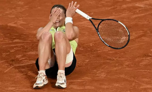 Poland's Maja Chwalinska reacts after winning the semifinal tennis match against Russia's Diana Shnaider at the French Open in Paris, Thursday, June 4, 2026. (AP Photo/Emma Da Silva)