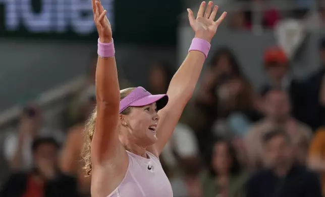 Russia's Mirra Andreeva reacts after winning during the semifinal tennis match against Ukraine's Marta Kostyuk at the French Open in Paris, Thursday, June 4, 2026. (AP Photo/Thibault Camus)